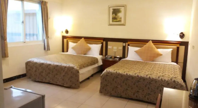 Четырёхместный номер Standard Puti Commercial Hotel
