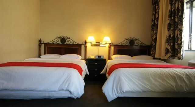 Четырёхместный номер Standard Garden Suite Hotel and Resort