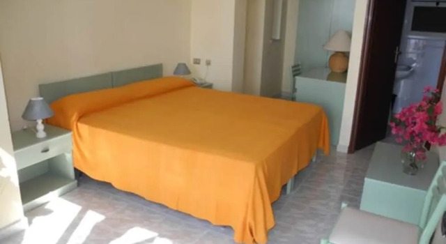 Четырёхместный номер Standard Hotel Villaggio Capo Alaua