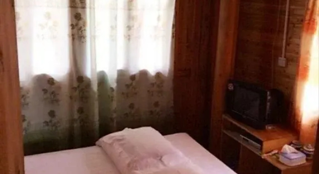 Longsheng Zhaihualou Inn