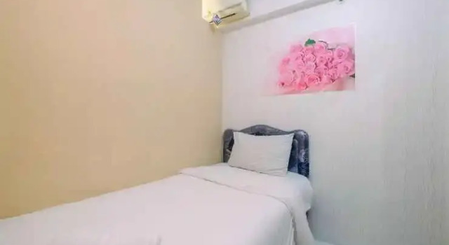 Compact and Homey 2BR Cibubur Village Apartment By Travelio