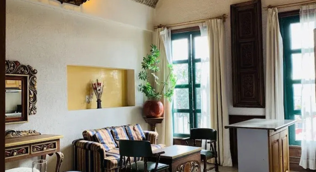 Четырёхместный номер Deluxe с балконом hotel la ermita suites