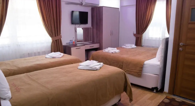 Четырёхместный номер Standard с балконом Figen Hotel