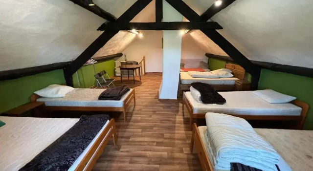 Кровать в общем номере Le Domaine De Malchamps