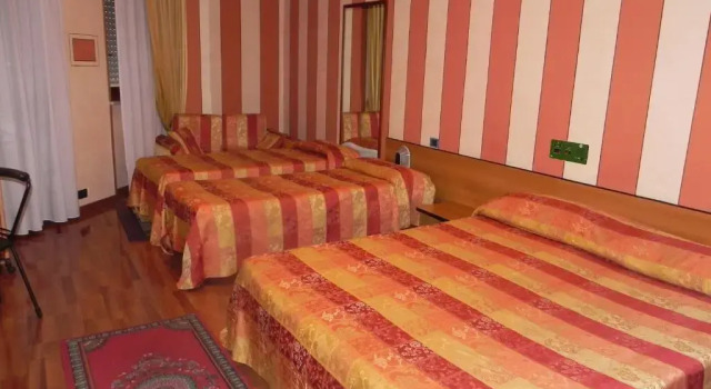 Четырёхместный номер Standard с балконом Phi Hotel Pianfei