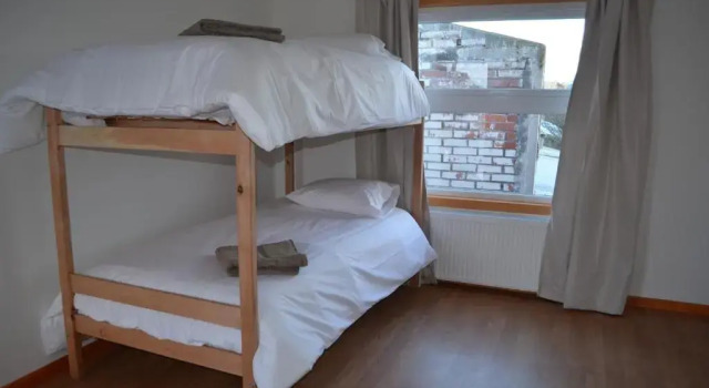 Кровать в общем номере Hostal Camino de Santiago