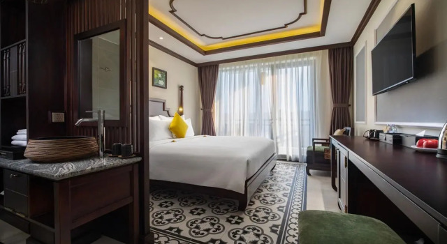 Двухместный номер Deluxe Grand Signature Resort Hoi An by M Village, a brand of Modern Village Lifestyle