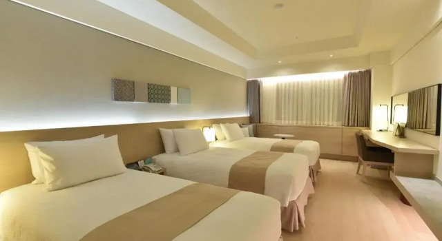 Standardowy trzyosobowy pokój Pacific Hotel