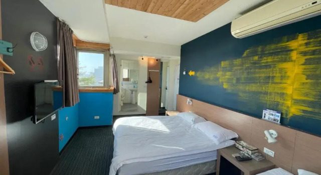 Трёхместный номер Deluxe с видом на море Breeze and Waves Hostel