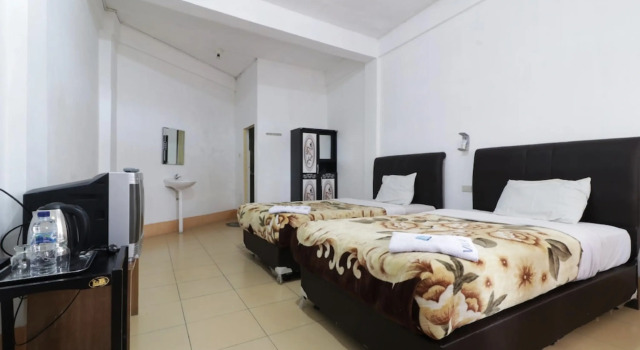 Номер Superior Villa Keluarga Bre Batunanggar