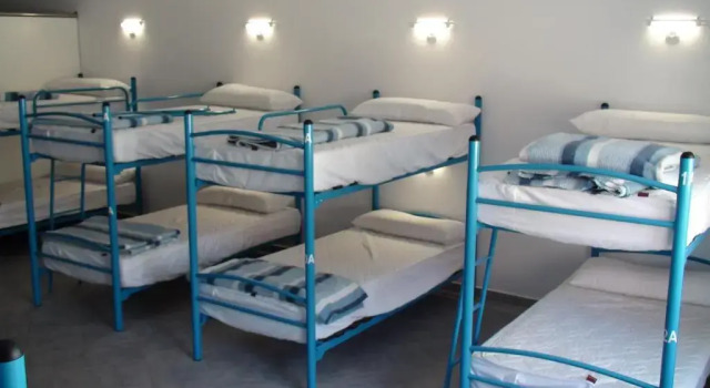 Кровать в общем номере Albergue @ Muxia