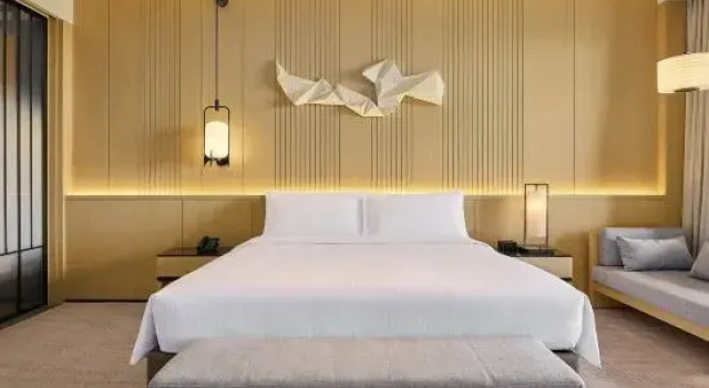 Люкс Ambassador Secan Hotel Qingdao, Curio Collection By Hilton
