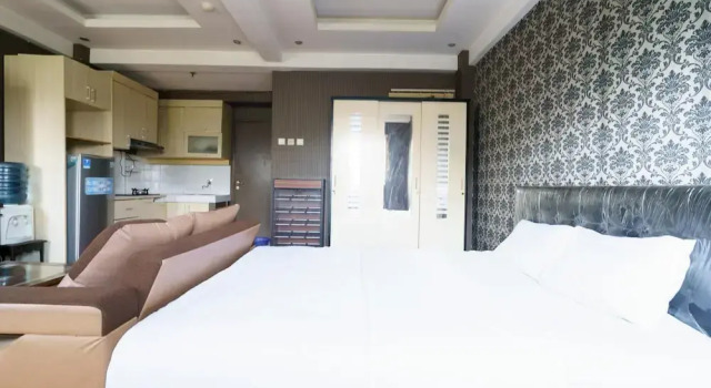 Номер Deluxe OYO 94238 The Suite Metro Apartment By Riz Living