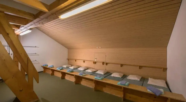 Кровать в общем номере juhui Lenzerheide