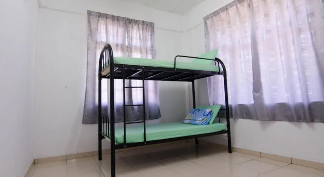 Кровать в общем номере Anggerik Residence