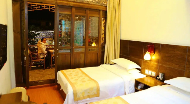 Fairyland Hotel Taihe Ju, Prenota Hotel Dali Yunnan
