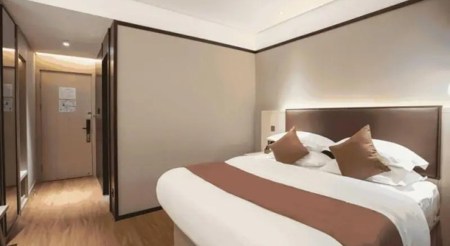 Номер Deluxe GYA Shanghai Jiangpu Hotel