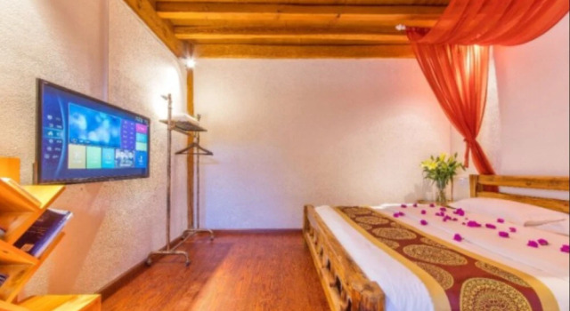 Yilanfenghua Hostel, Забронировать Хостел Лицзян Юньнань, рядом с Улица Сквер-стрит Древнего города Даянь