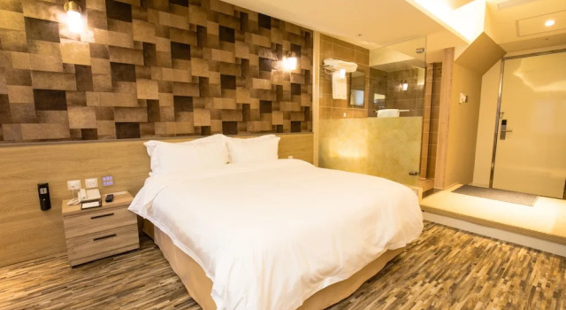 O podwyższonym standardzie dwuosobowy pokój Walker Hotel Ximen