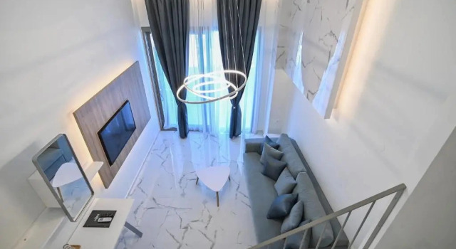 Четырёхместный полулюкс Deluxe Rihios Hotel