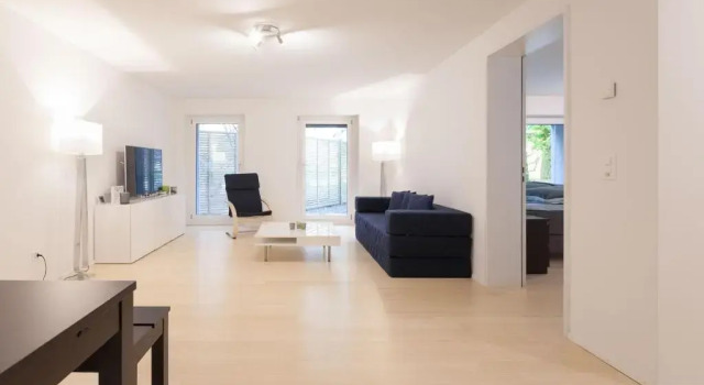 Апартаменты 2,5 Zi Design Loft Wohnung mit Gartensitzplatz