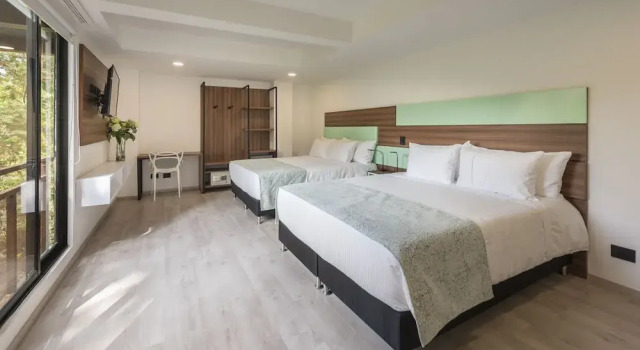 Четырёхместный семейный номер Standard Foresta Hotel