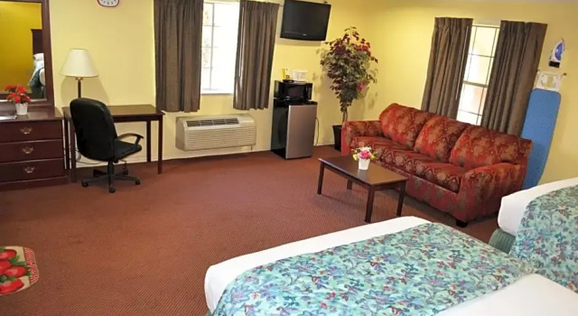 Полулюкс Executive Inn & Suites Magnolia