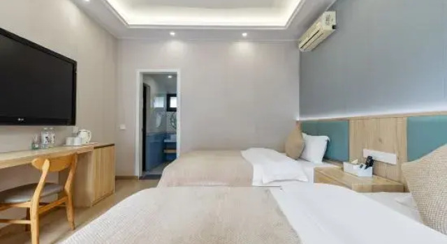Кровать в общем номере Sanjiang Youjian Courtyard
