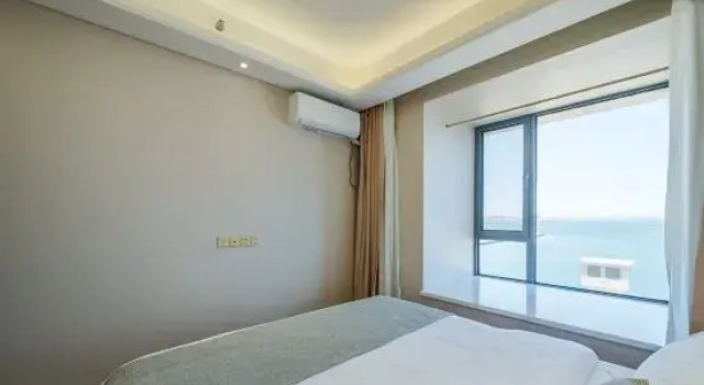 Люкс Deluxe с 2 комнатами с видом на море Yuepeng Boutique Apartment (Dalian Harbour Plaza)