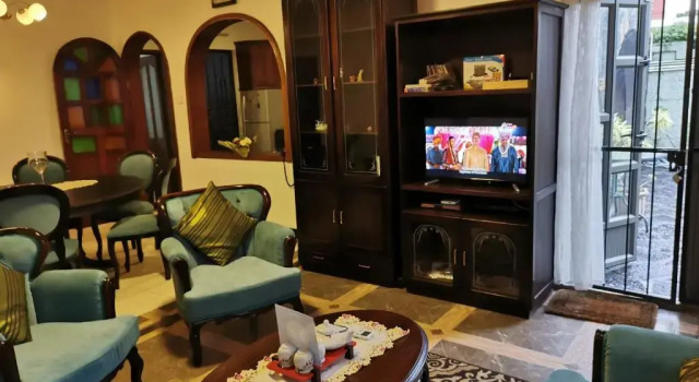 Апартаменты R&G Justlikehome Apartment 1 with blue sofa set and Apartment 2 with Garden View with brown sofa set