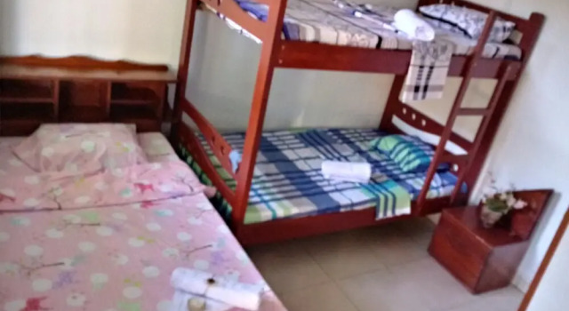 Кровать в общем номере Kitara House Backpackers Hostel