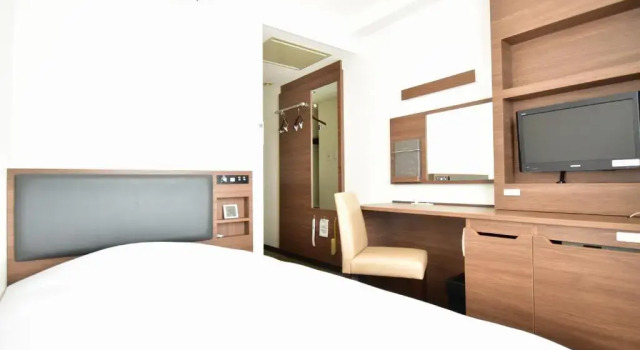 Номер Economy Hotel New Amami