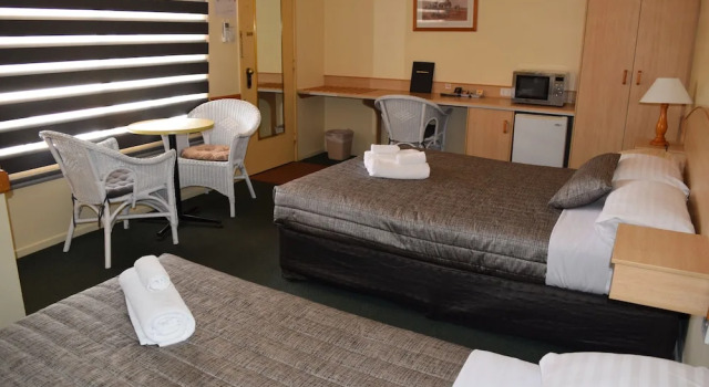 Кровать в общем номере Warwick Vines Motel