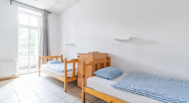 Кровать в общем номере Hostel Katowice Centrum