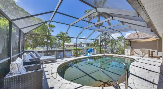 Коттедж с 3 комнатами Punta Gorda 3-Bedroom Canalfront Vacation Home with Dock 3 Home