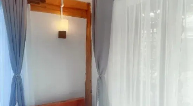 Кровать в общем номере XiSu HOMESTAY