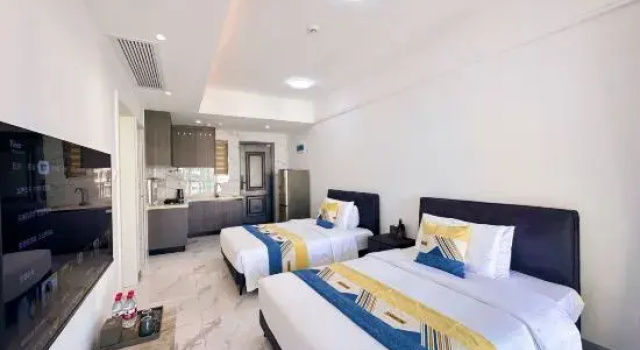 Четырёхместный семейный люкс с балконом и с видом на море Beihai He'an Coast Liwan Homestay
