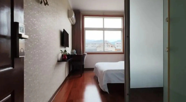 Xindongshan Business Hotel, Забронировать Отель Ичан Хубэй