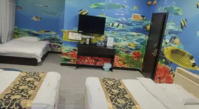 Кровать в общем номере Shanghai Rongle Hotel
