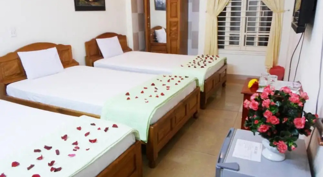 Кровать в общем номере с балконом Lucky Hội an Hotel