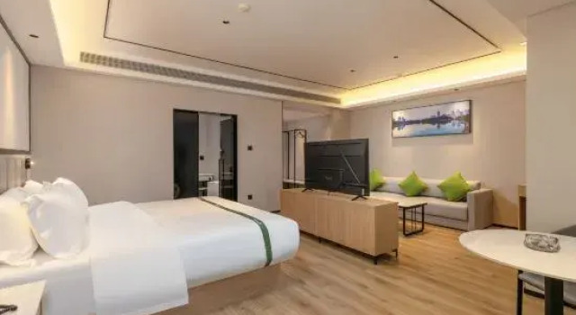 Люкс Deluxe GreenTree Inn Smart Selection Hotel (Mengyang Bus Terminal Branch, Jinghong City)