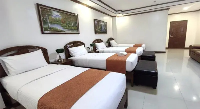 Кровать в общем номере Ferrymar Hotel Iloilo