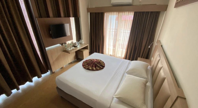 Номер Deluxe Kareem Syariah Hostel Bukittinggi