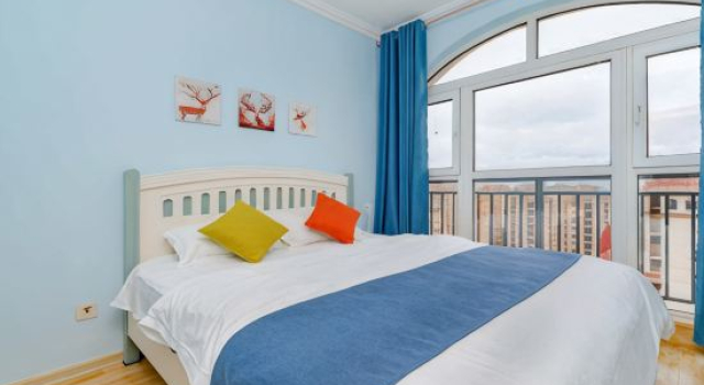 Люкс с 2 комнатами Qingdao Tianze Seaview Apartment