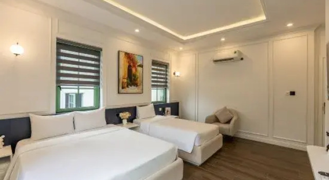 Кровать в общем номере с видом на сад S-Solution Villa Phu Quoc by DDH