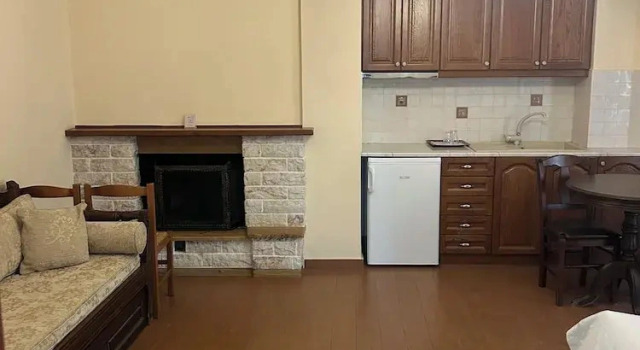 Четырёхместный номер Deluxe с балконом и с видом на горы Aristarchos Lodge