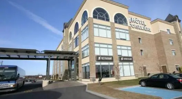 Кровать в общем номере Hotel LOie des neiges