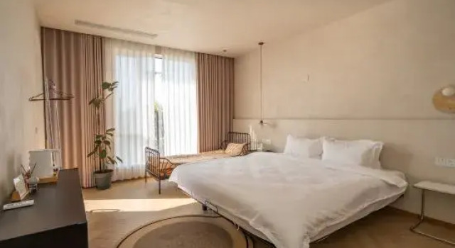 Кровать в общем номере Luyuan Homestay