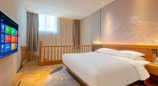 Четырёхместный люкс Comfort с 2 комнатами с балконом Zhangjiakou Fulong Fengling Yuegu Fanwoods Hotel