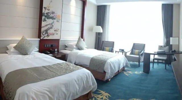 Номер Deluxe Binhai Jinling International Hotel